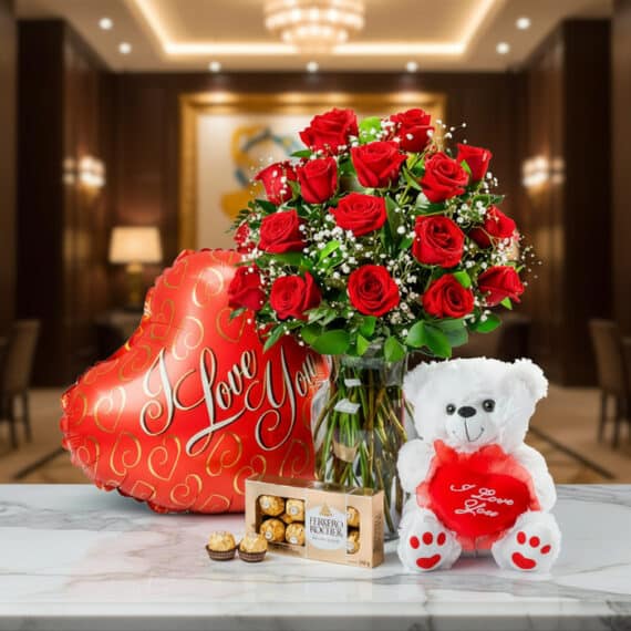 Jarrón Dulce Amor con rosas rojas frescas, un osito de peluche blanco con corazón rojo, chocolates Ferrero Rocher y un globo
